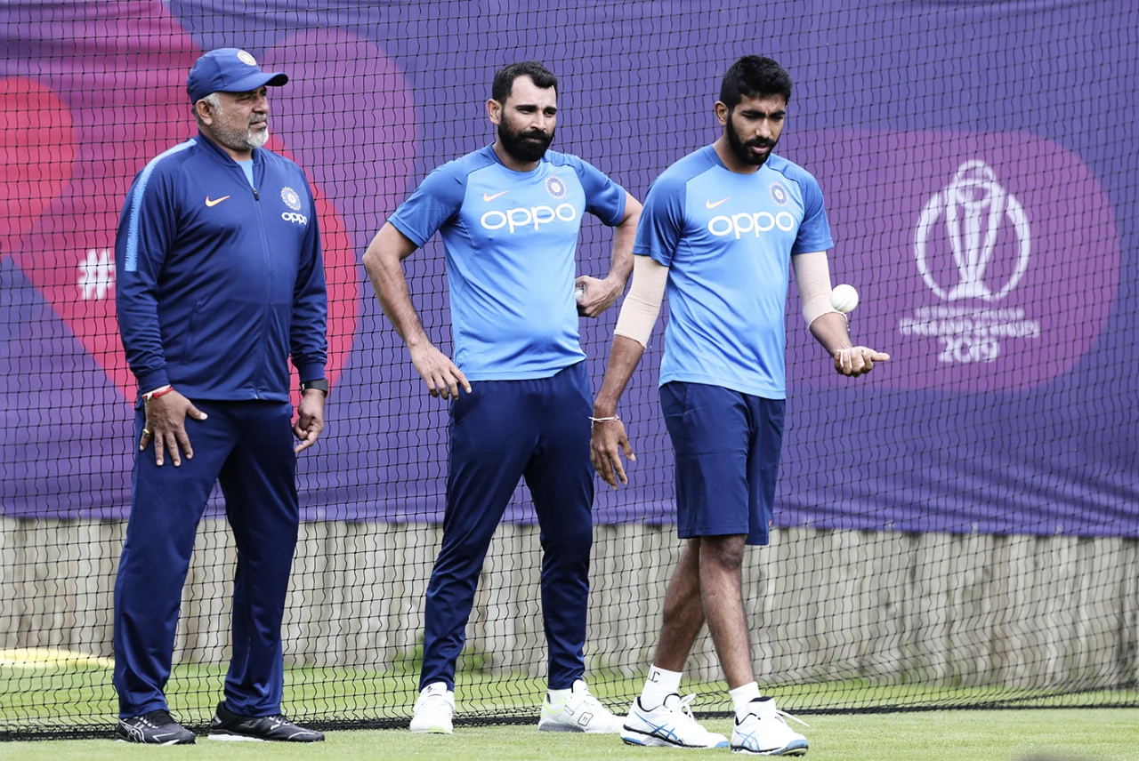 Bharat Arun with Mohammed Shami and Jasprit Bumrah